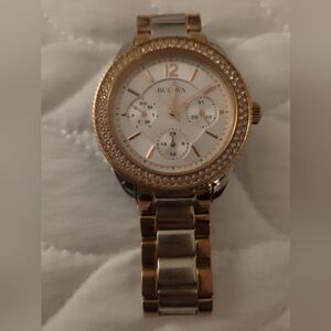 BULOVA BEAUTIFU women's crystal bezel face watch. Gold/rose gold color two tone.